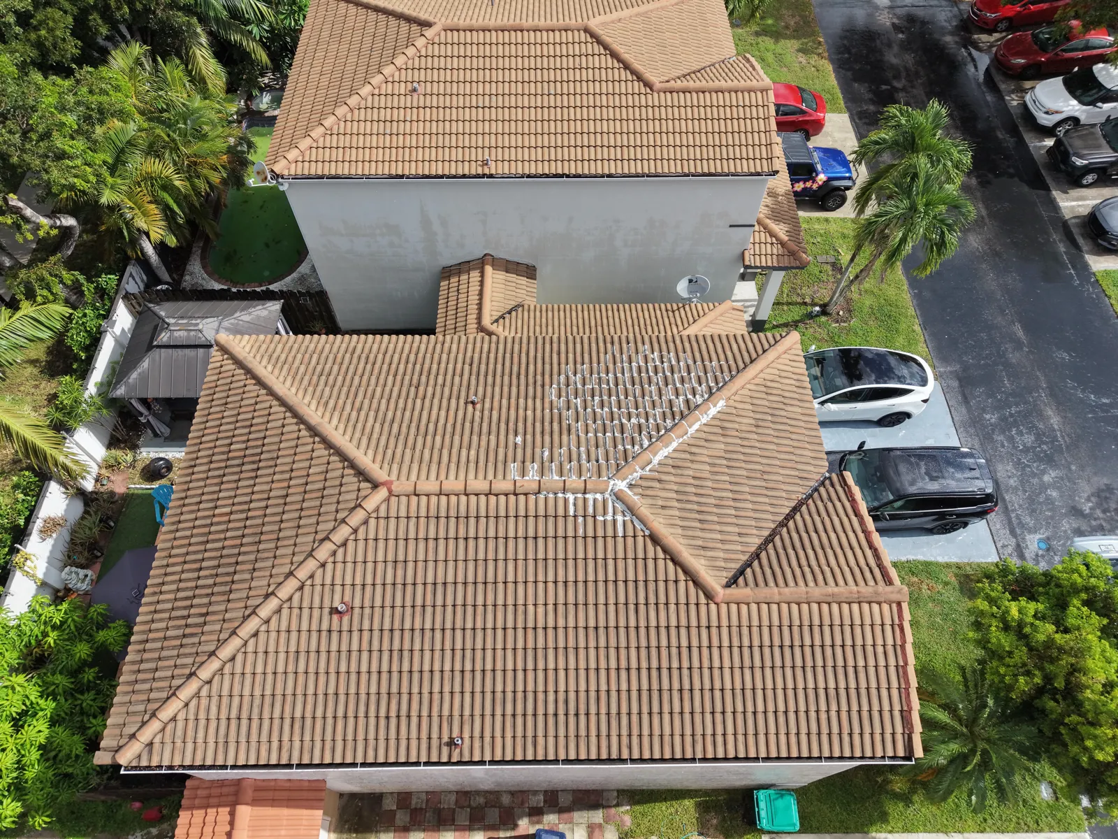 Drone view of a barrel tile hip roof