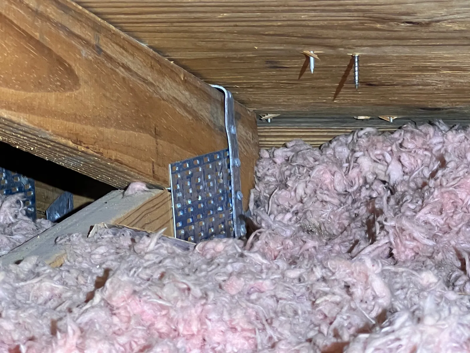 Roof-to-wall strap in a South Florida attic